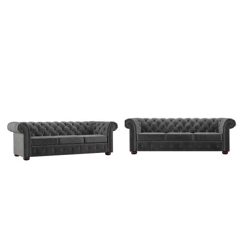 Divano Chesterfield trapuntato con braccioli arrotolati