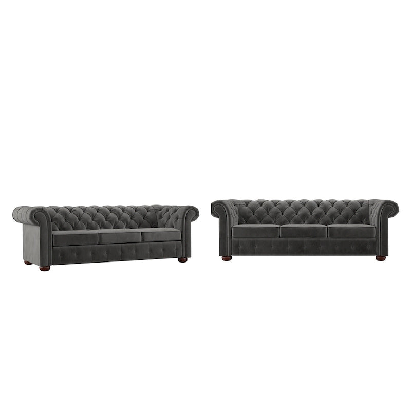 Divano Chesterfield trapuntato con braccioli arrotolati