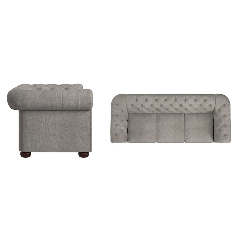 Divano Chesterfield trapuntato con braccioli arrotolati