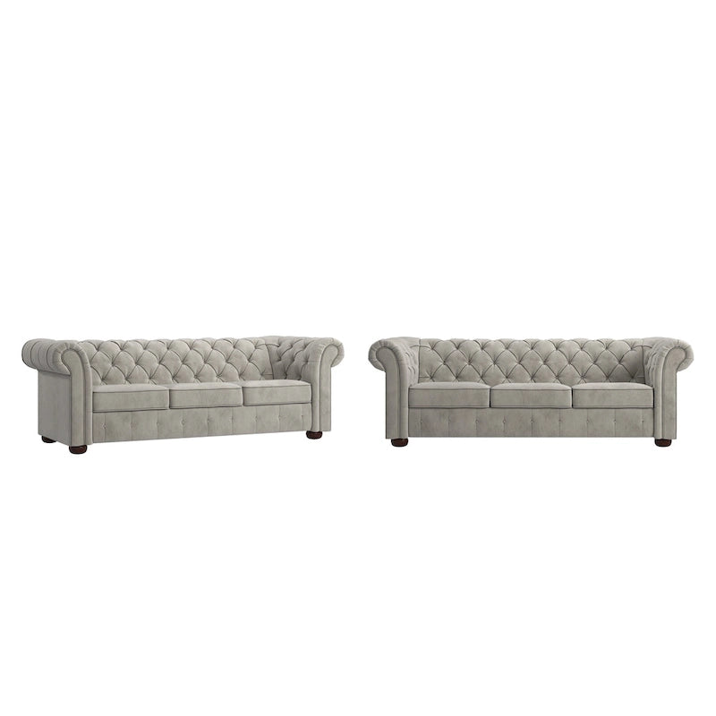 Divano Chesterfield trapuntato con braccioli arrotolati