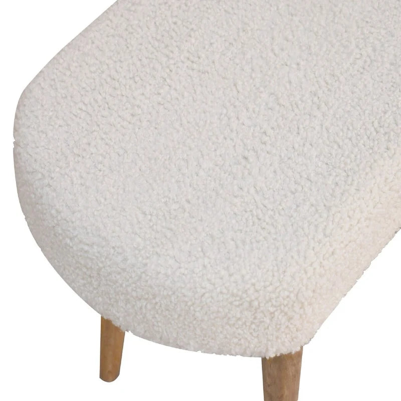 Panca imbottita con gambe in legno