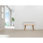 Panca imbottita con gambe in legno